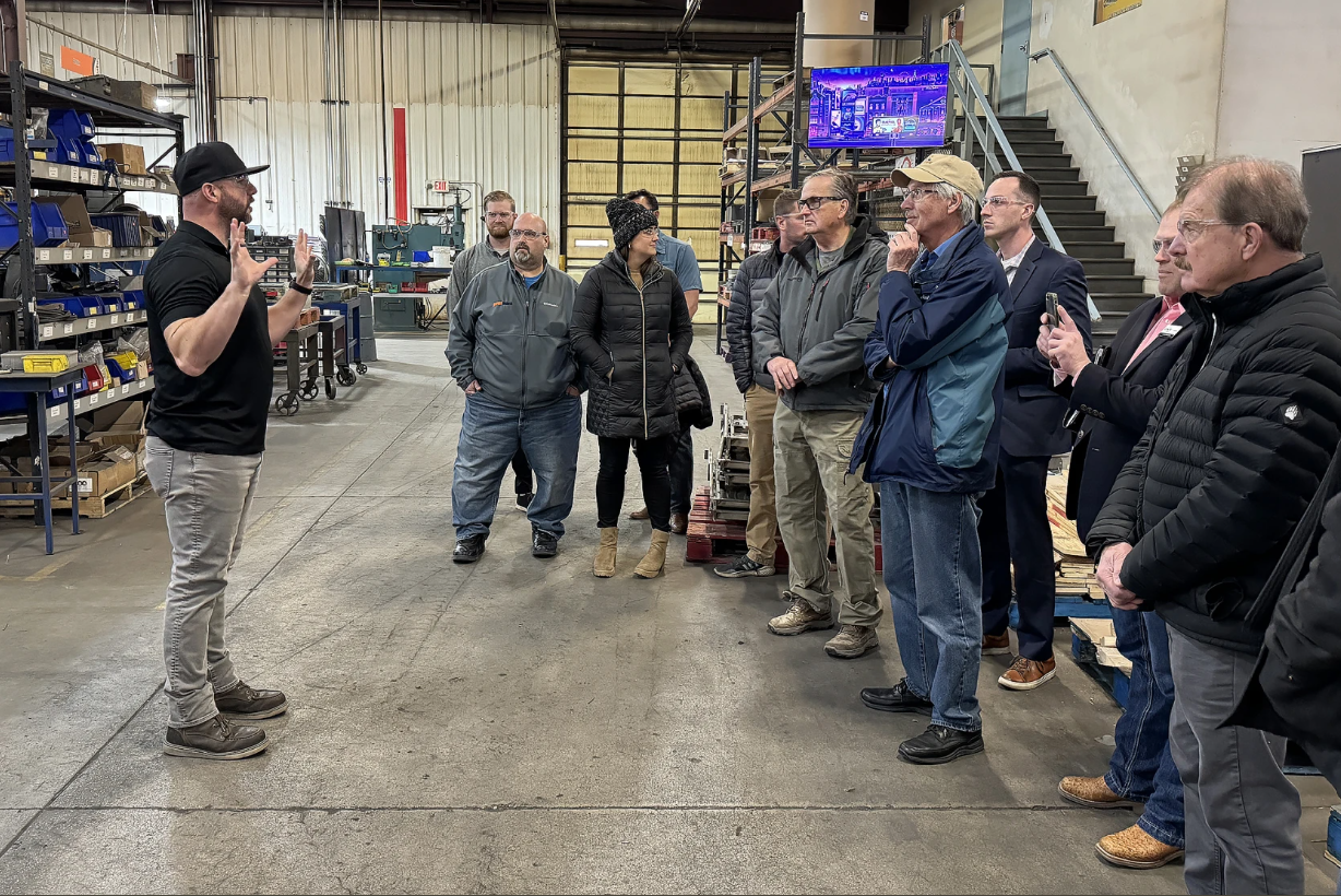 Click the Jamestown, state officials tour businesses that received automation grants Slide Photo to Open