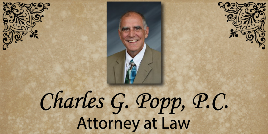 Charles G. Popp, P.C.'s Logo