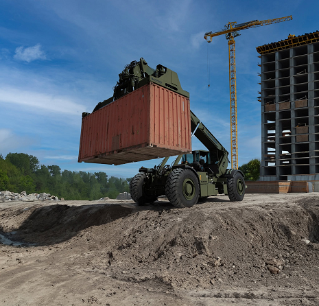 The image is of a Rough Terrain Container Handler (RTCH), commonly designated as the RT240 / RT250 model built by Kalmar in partnership with the Independent Rough Terrain Center (IRTC).