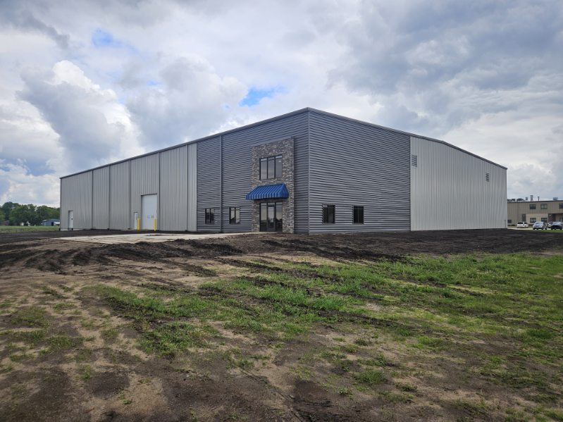 Click the Spencer Speculative Building Substantially Complete Slide Photo to Open