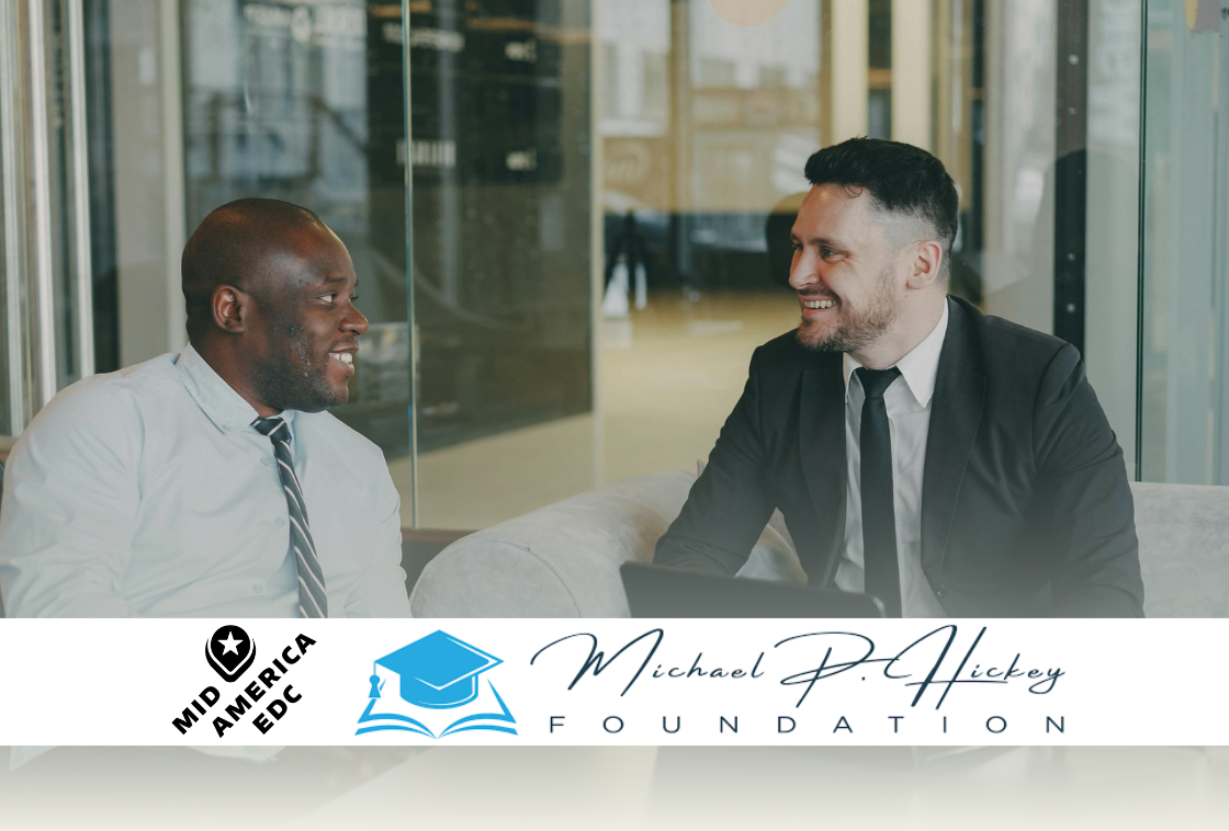 Two businessmen smiling with Mid-America EDC and Hickey Foundation logos