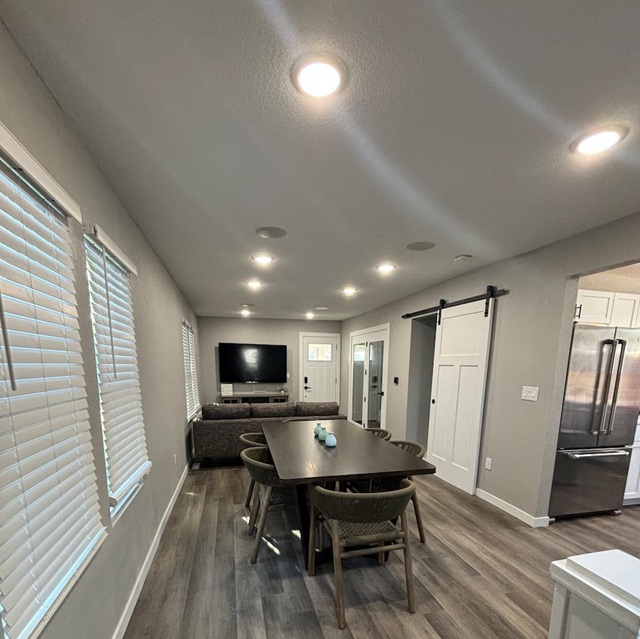 AirBnb The White Travel House's Logo