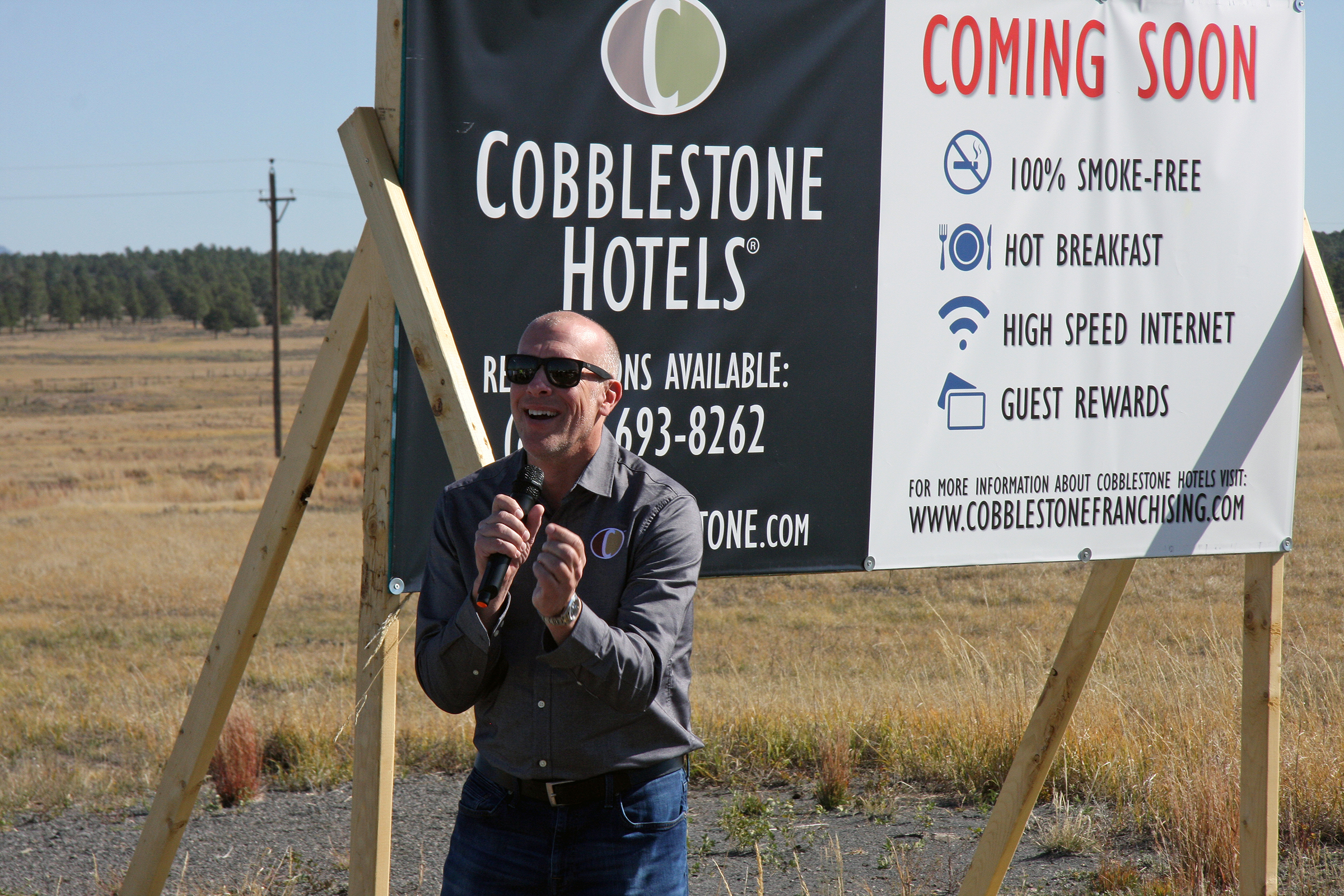 Cobblestone Inn & Suites CEO Brian Wogernese speaks with the crowd gathered for the ceremonial groundbreaking of a new hotel development project in Upton on Tuesday, October 5.