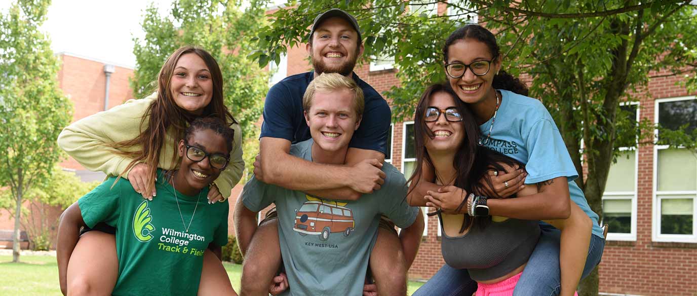 happy students posing as a group