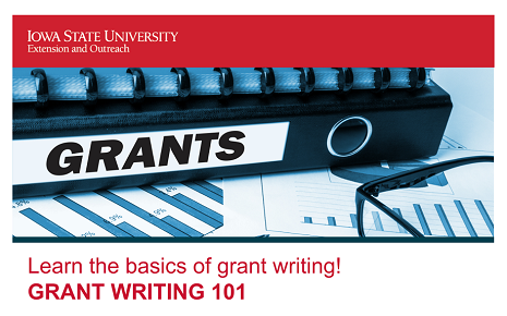 The image depicts a black binder labeled "GRANTS" resting on financial charts next to glasses and a pen, introducing the basics of grant writing and funding acquisition.