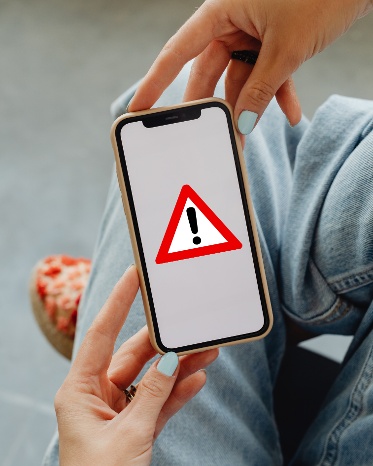 Mobile phone displaying an emergency warning
