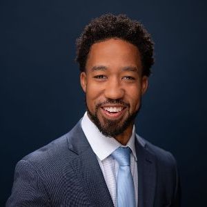 Click the Erron Smith photo to open