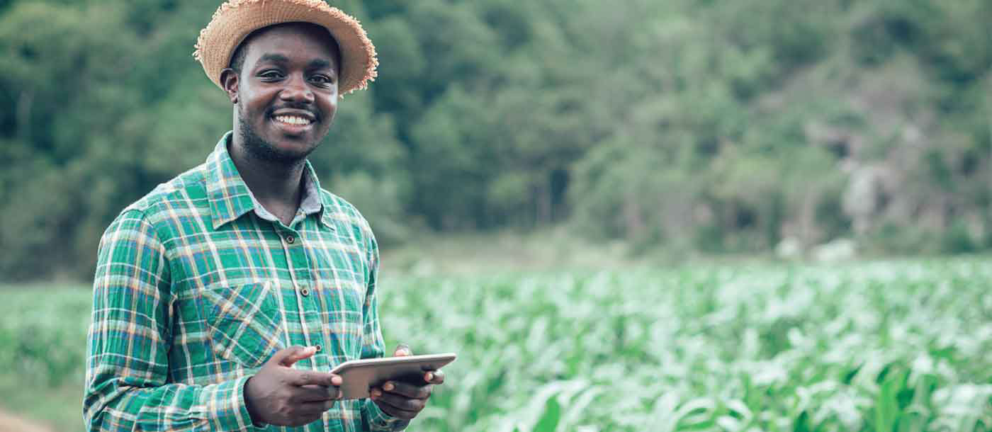 young farmer using a digital tablet