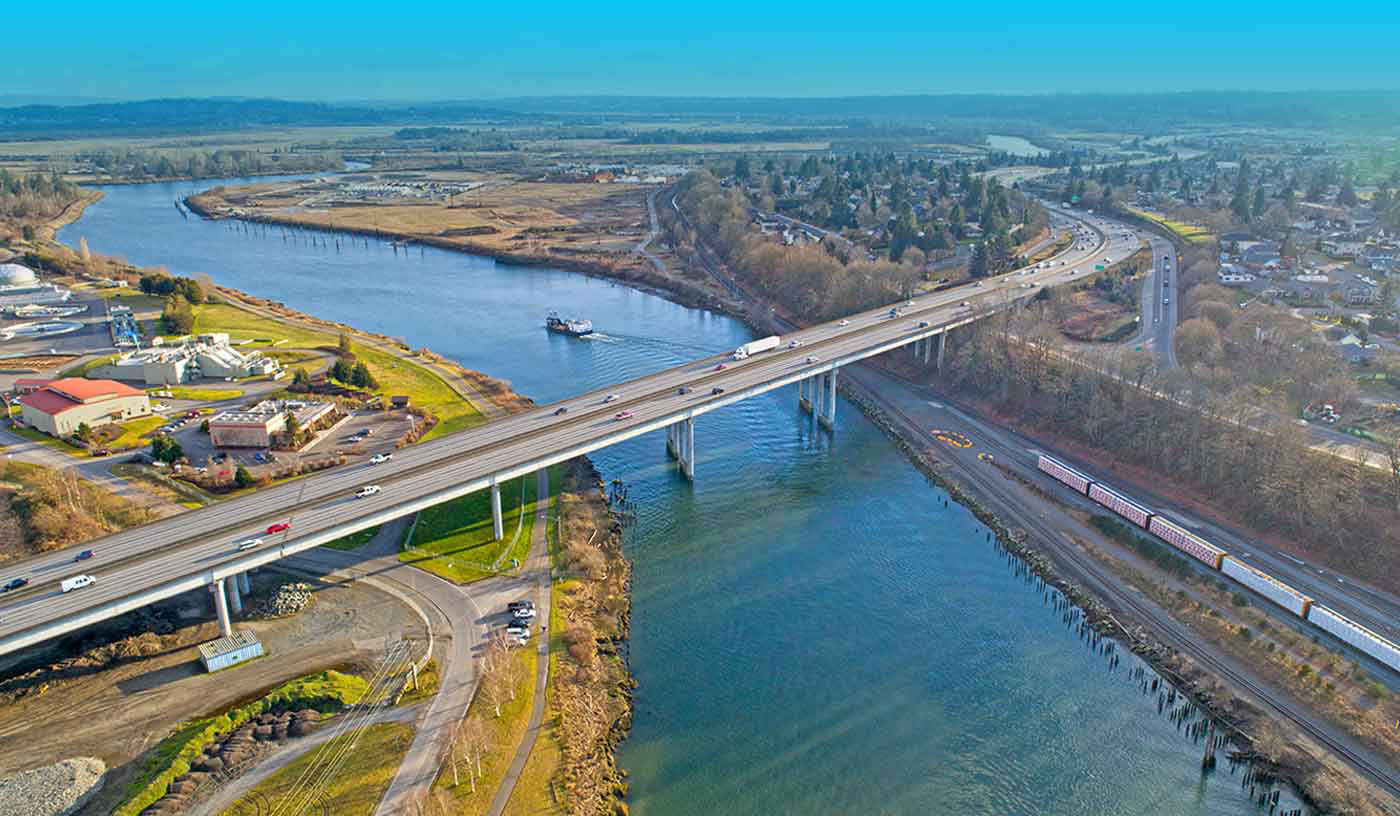 aerial view of cars crossing a bridge