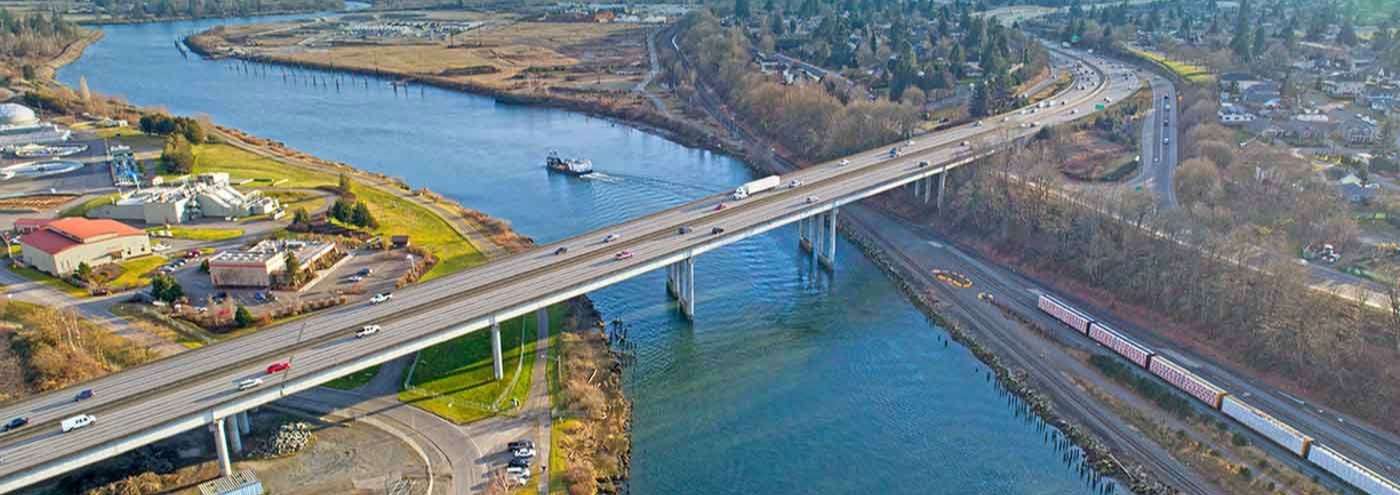 aerial view of cars crossing a bridge