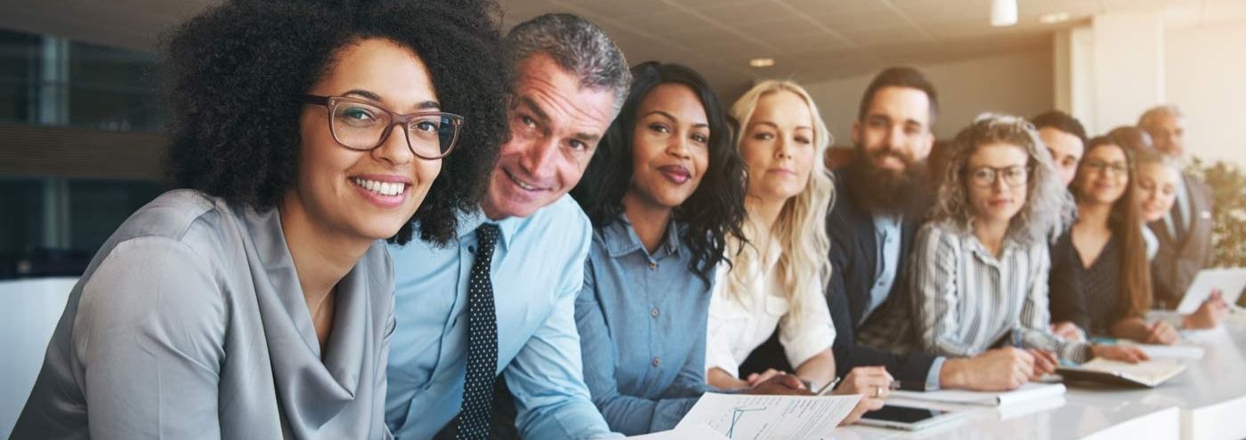 group of smiling business peers