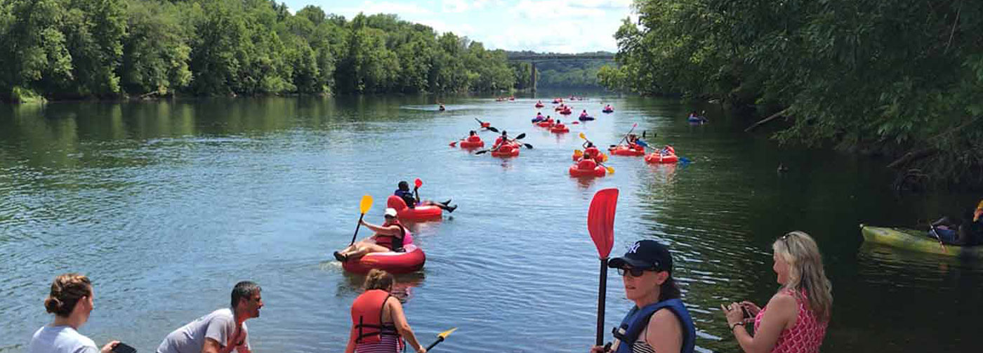 Personal recreationa water craft launching on a river