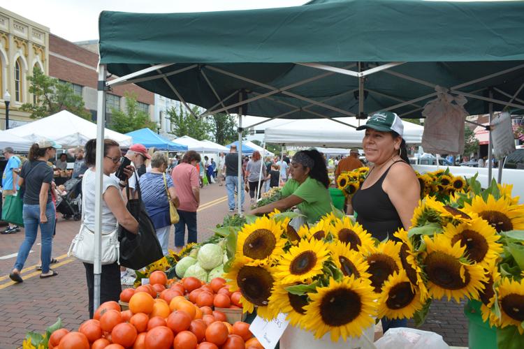The Downtown Beloit Farmers Market offers food, flowers, baked goods and more each saturday in the summer and fall in downtown Beloit. BDN file photo