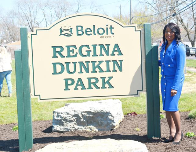 Regina Dunkin stands by a sign that was placed at the former Summit Park on Saturday. The park was renamed Regina Dunkin Park to honor Dunkin who will be stepping down as Beloit City Council president this week. Clint Wolf/Beloit Daily News