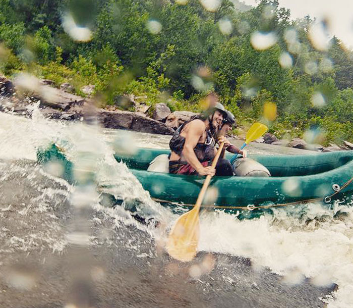 Kids tubing on a river