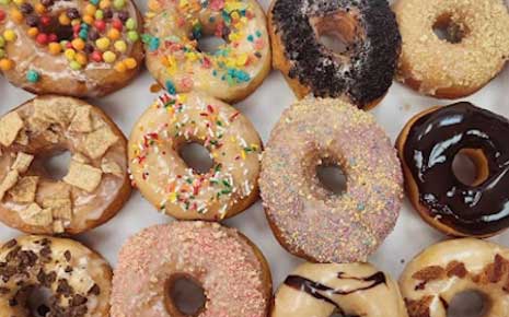 Click the Scratch-Made Sweets & Savory Treats at Sugar Plum’s Bakery slide photo to open