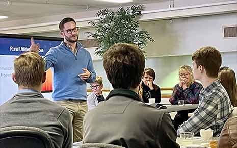 man giving presentation to engaged audience