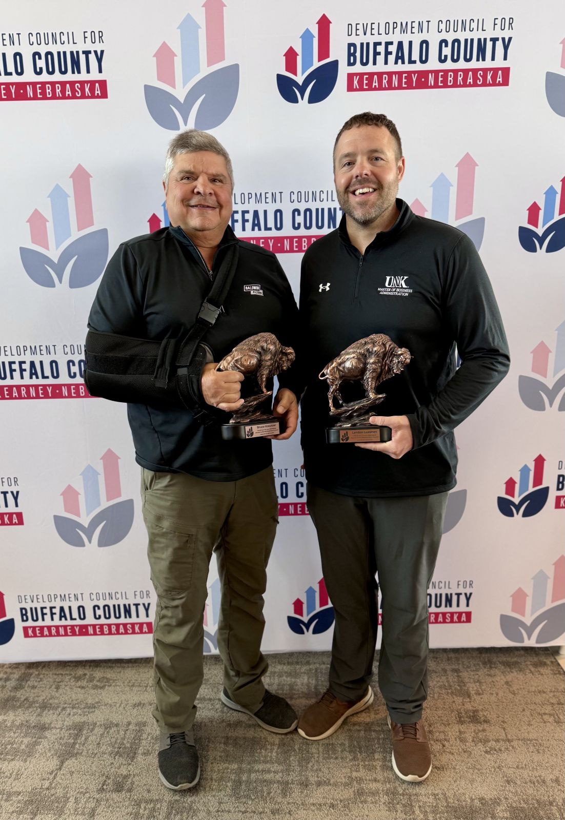 Outgoing board members Bruce Kreutzer and Landon Lueshen