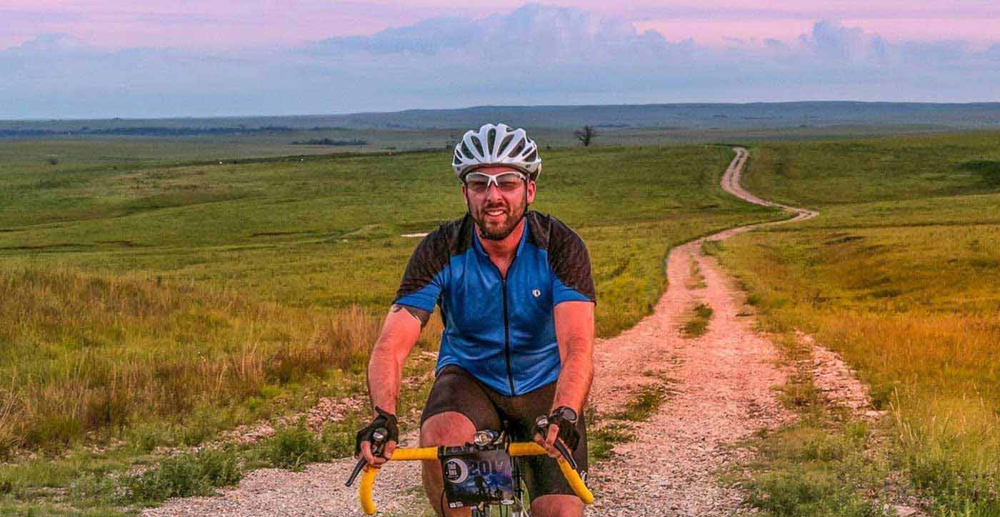 cyclist on unpaved trail