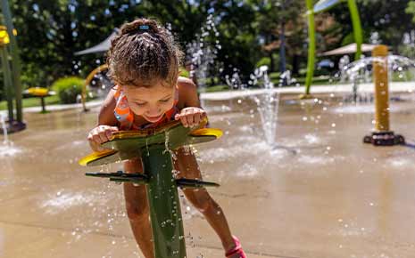 child at a splashpad