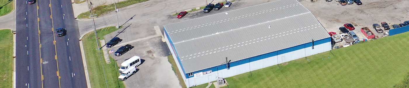 aerial view of warehouse and road