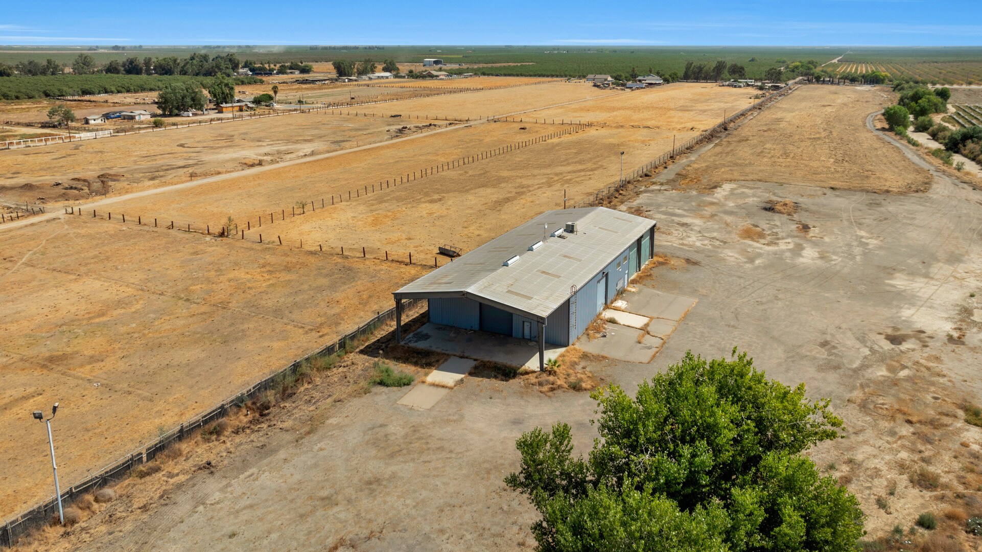 Main Logo for Steel Industrial Building with 15 Acres- 6785 Road 136, Earlimart,CA, Building size: 10,000SF, Lot size: 15AC, Zoning: M-1 (Industrial - Manufacturing)