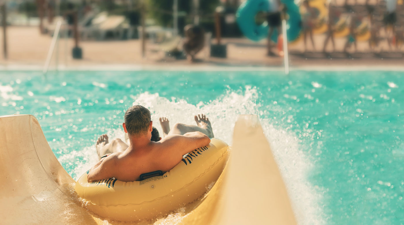 man on waterslide