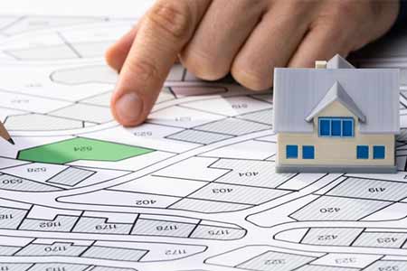 developer hands, development blueprints, toy house