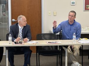 Eastern Hancock Superintendent Dr. George Philhower, right, speaks at the Lunch and Learn while Greenfield-Central Superintendent Dr. Harold Olin listens on.