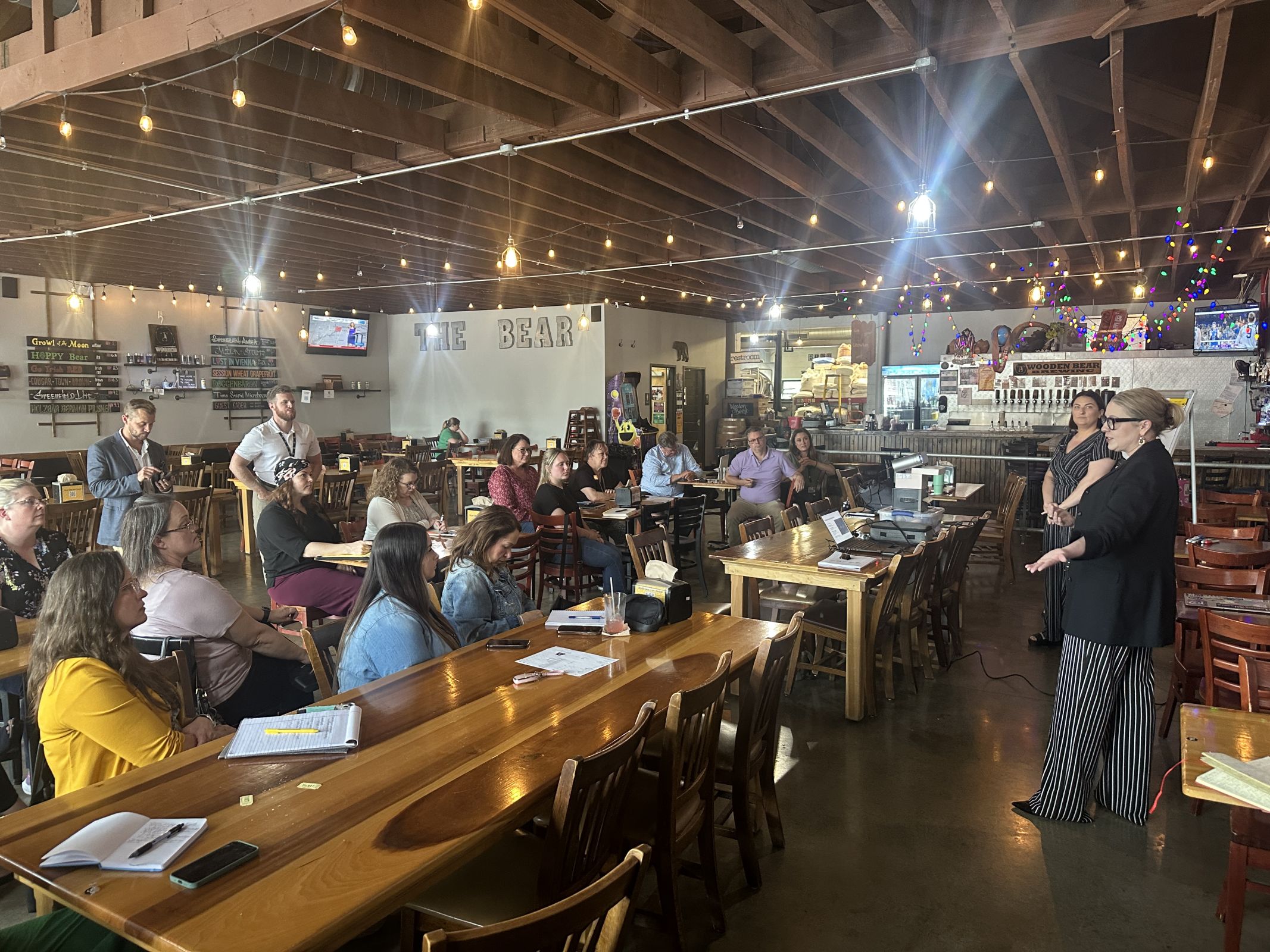 Laura Barnett, Talent Acquisition Manager for Hancock Health, presents at a HEDC HR Group meeting at Wooden Bear Brewing in Greenfield on June 18th, 2025.