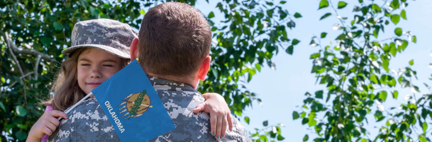 dad back from tour hugging daughter