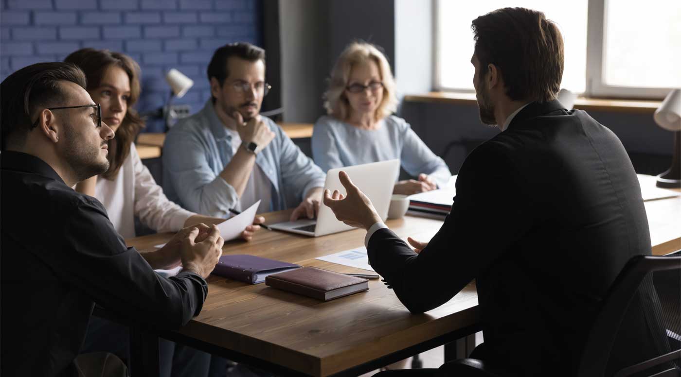 Professionals meeting around a conference table