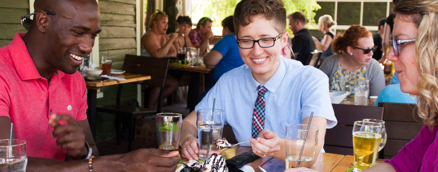 young people socializing over drinks