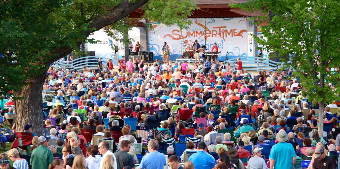 crowd watching a concert by george performance