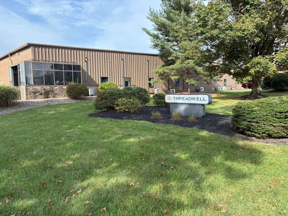 Fabtex merges with Quiltcraft; new Threadwell sign marks Danville facility Photo