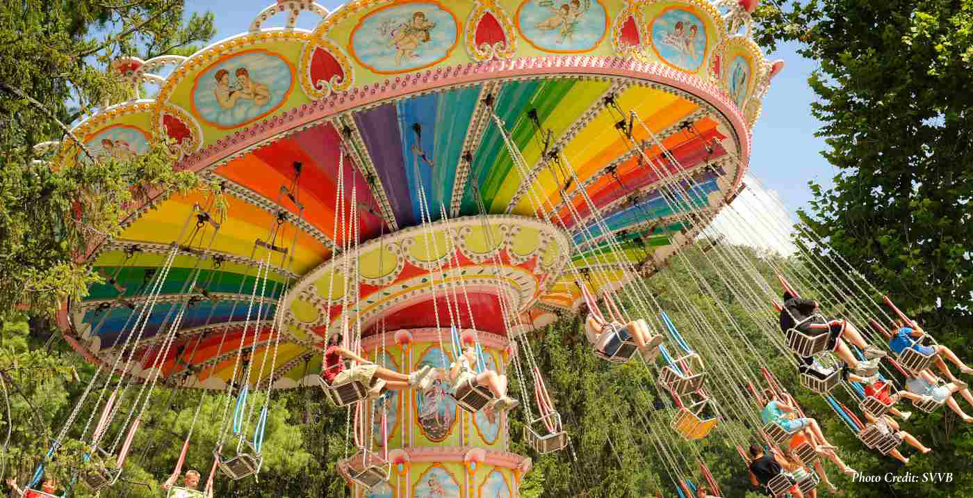 Knoebels Amusement Park visitors on a swing carousel ride