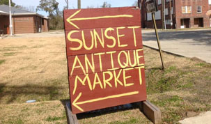 Sunset Antique Market & Auction House's Logo