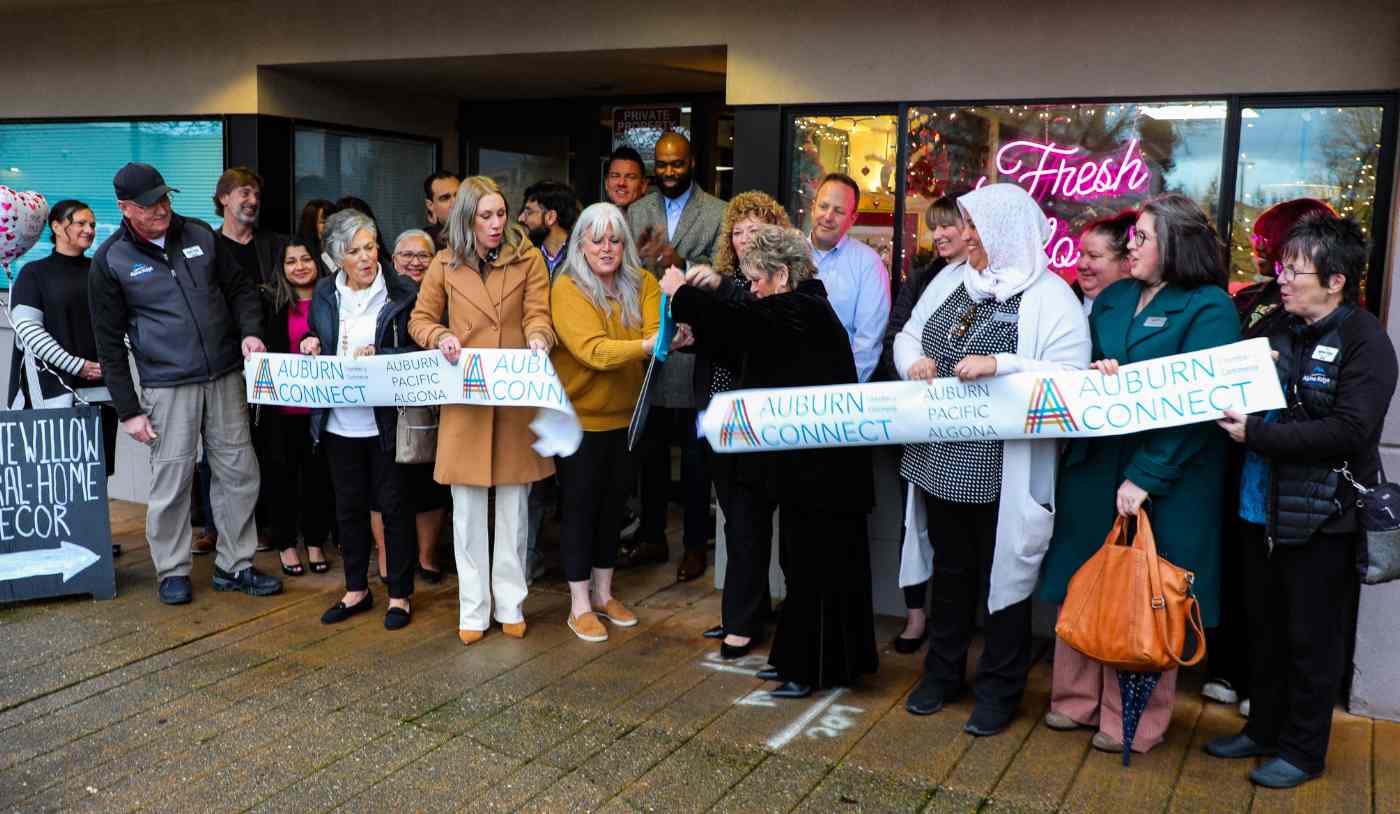 banner cutting ceremony for flower shop in Auburn WA