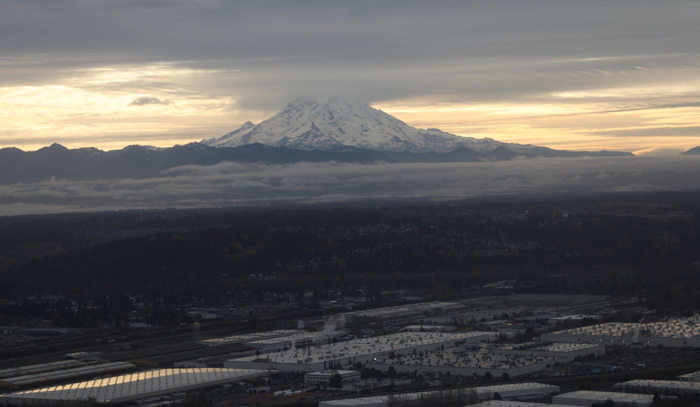 aerial view of buildings and a mountain in Auburn, WA