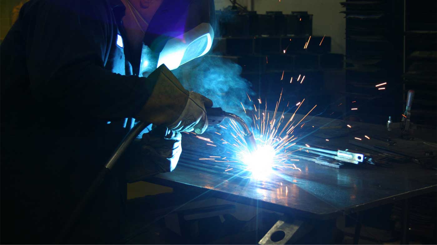 Man welding and sparks flying