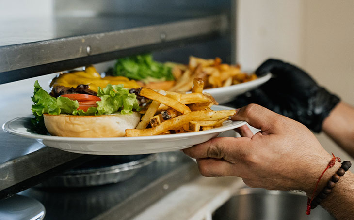 burgers and fries being served at the Pine Street Cafe in Pasadena, TX