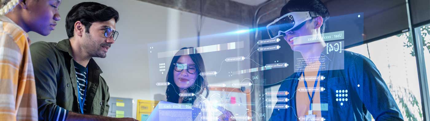 A group of people using VR technology in the workplace.