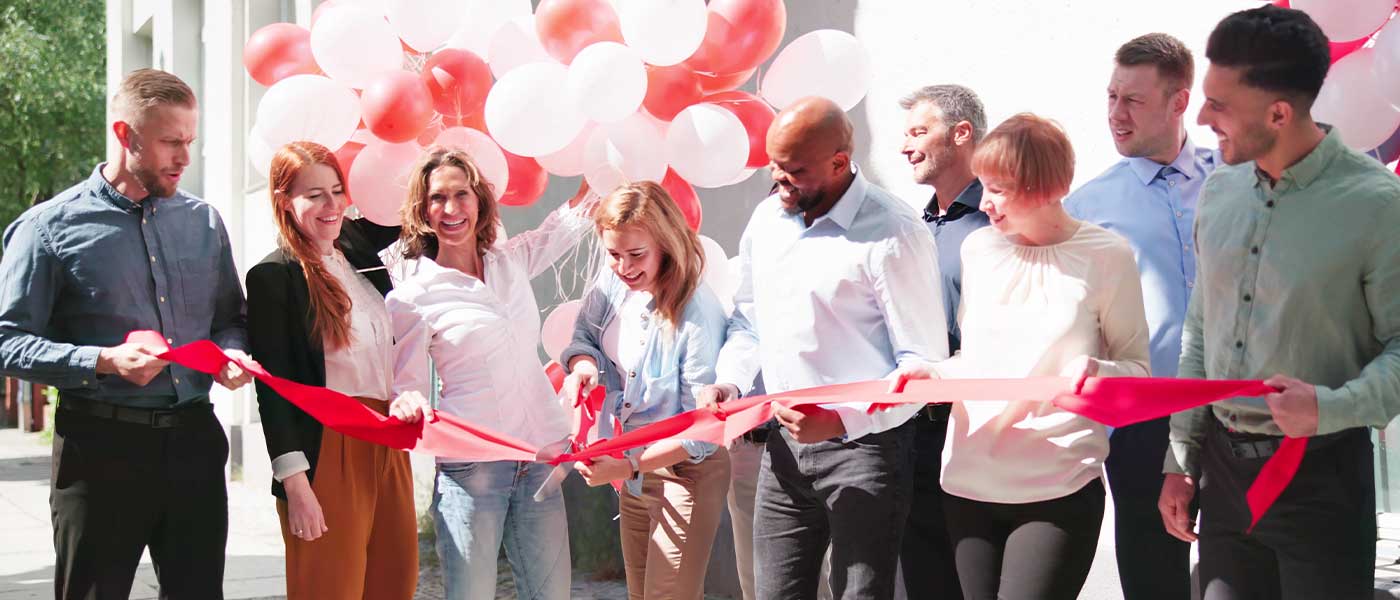 ribbon cutting ceremony of woman-owned business
