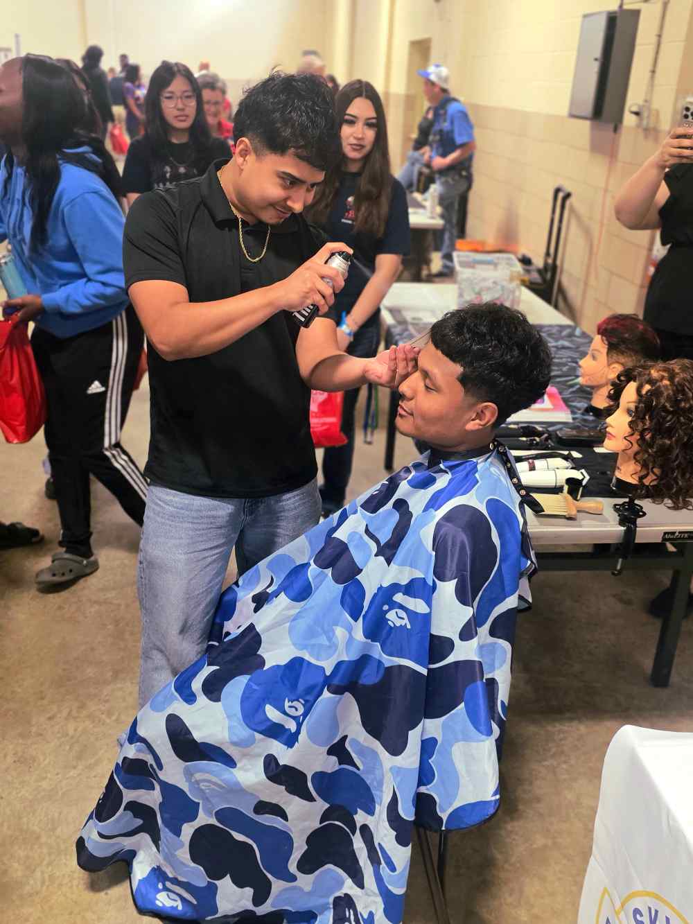 Teenage boy getting a haircut