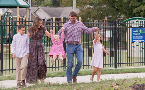 A family of four enjoying a park at Lake Reba in Richmond, KY