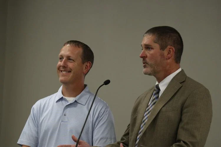 District Assessment Coordinator Steve Case and Chief Academic Officer James Ray present the latest batch of assessment data- Credit: Blake Vicars