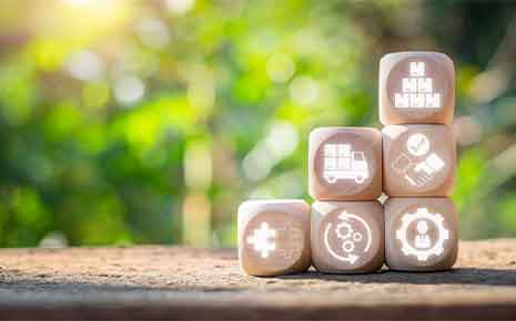 Wooden block on desk with supplier relationship management icon