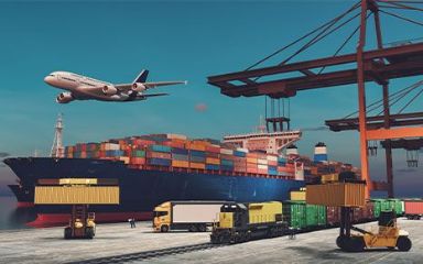 Container ship, freight train, and airplane operating at an international port terminal, 