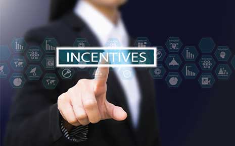 man pushing the incentives button concept