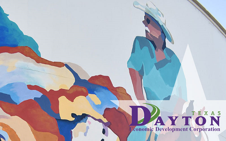 This image shows a public mural of a rancher overseeing their land in Dayton, Texas, supported by the Dayton Economic Development Corporation.